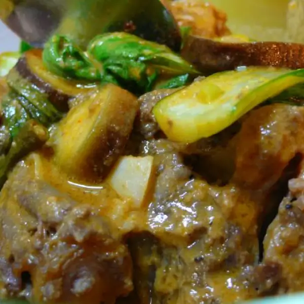 Estofado de rabo de toro con cacahuetes