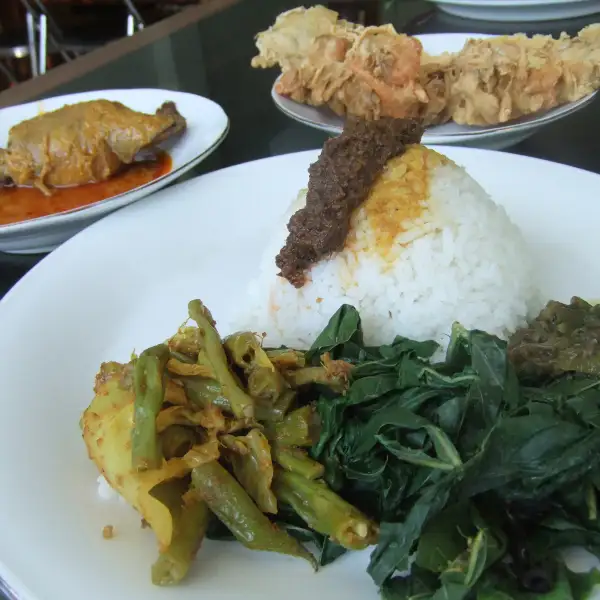 Fish curry, duck eggs, and vegetables
