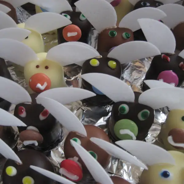 Chocolate kisses, chocolate-flavored marshmallows on a waffle