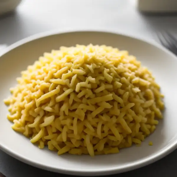 Gekookte en geraspte maniok, gestoofd met kokosmelk
