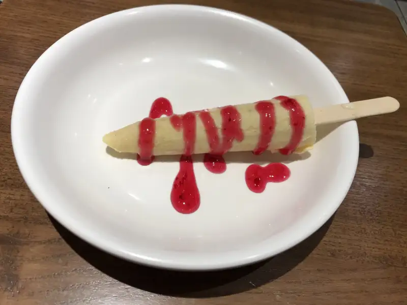 Frozen kulfi with red berries