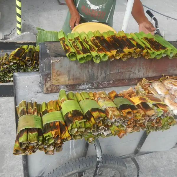 Tupig, a rice cake made with coconut milk and sesame seeds.